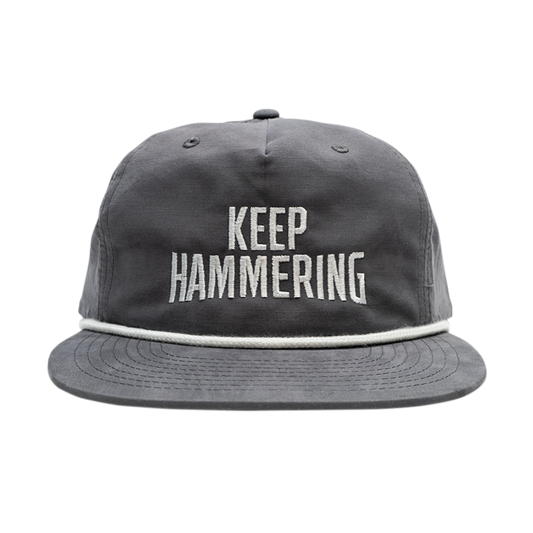 KEEP HAMMERING SNAPBACK HAT