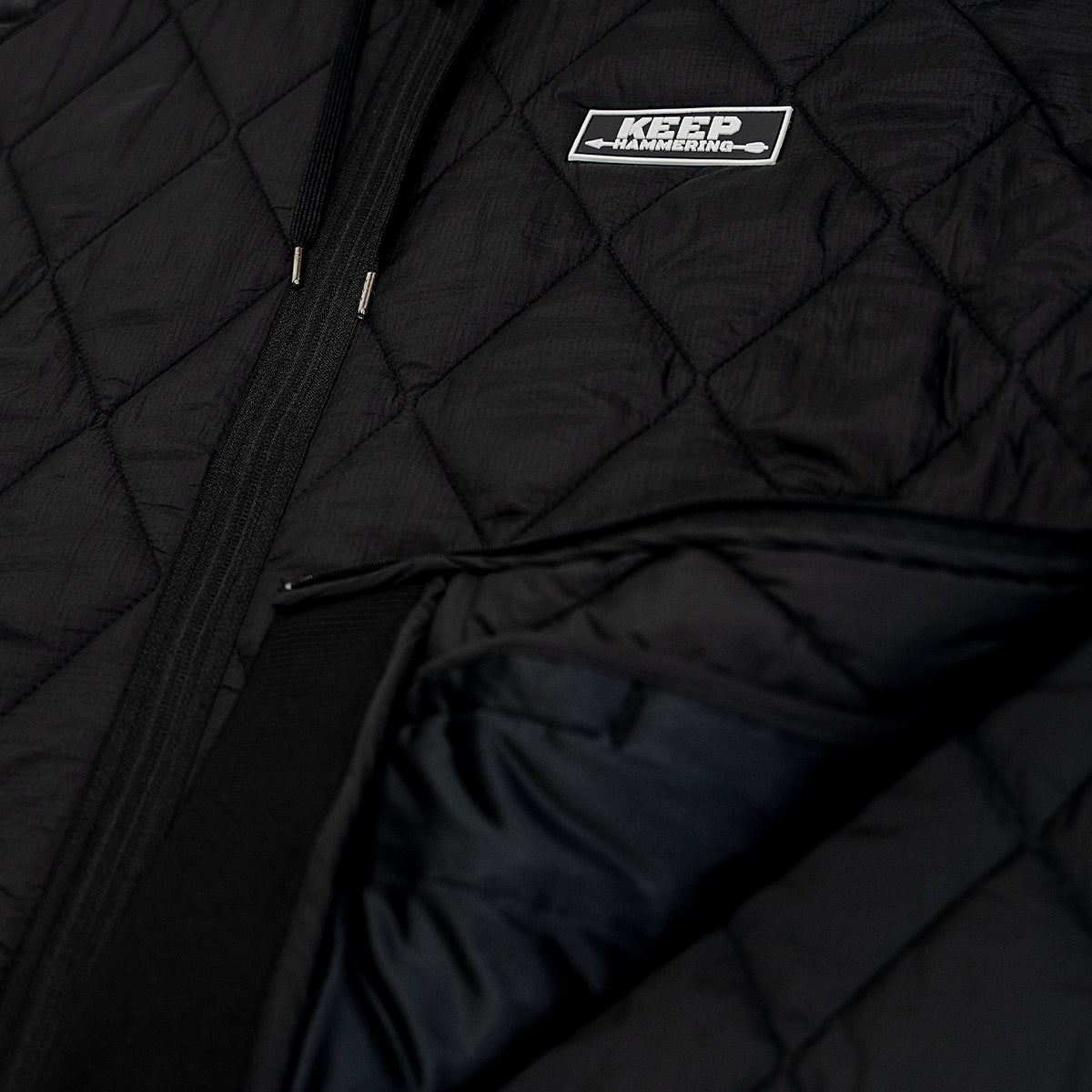 Keep Hammering Woobie Jacket in Black