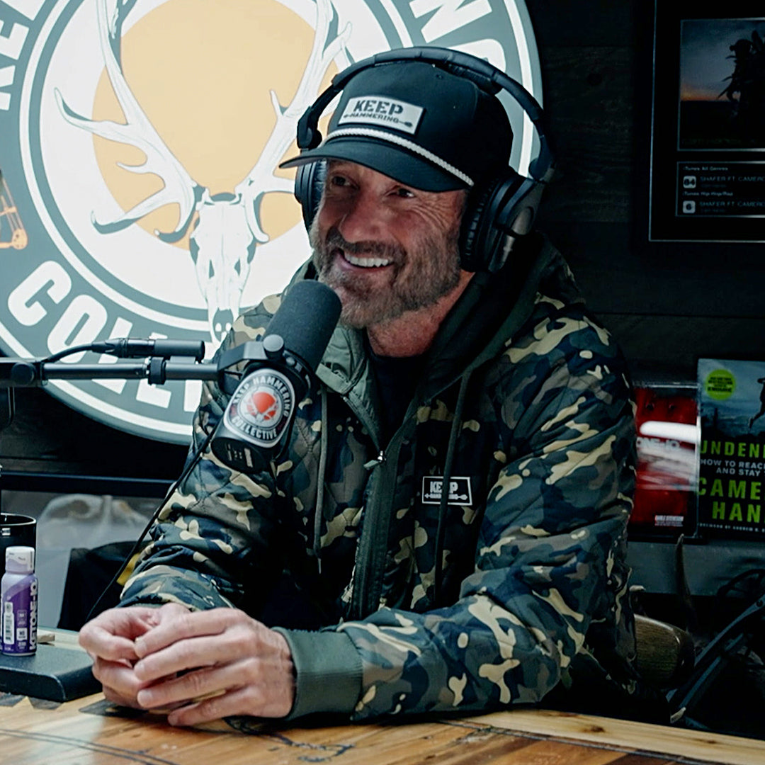 Keep Hammering Woobie Jacket in Woodland Camo, worn